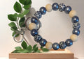 Blue cheetah wristlet