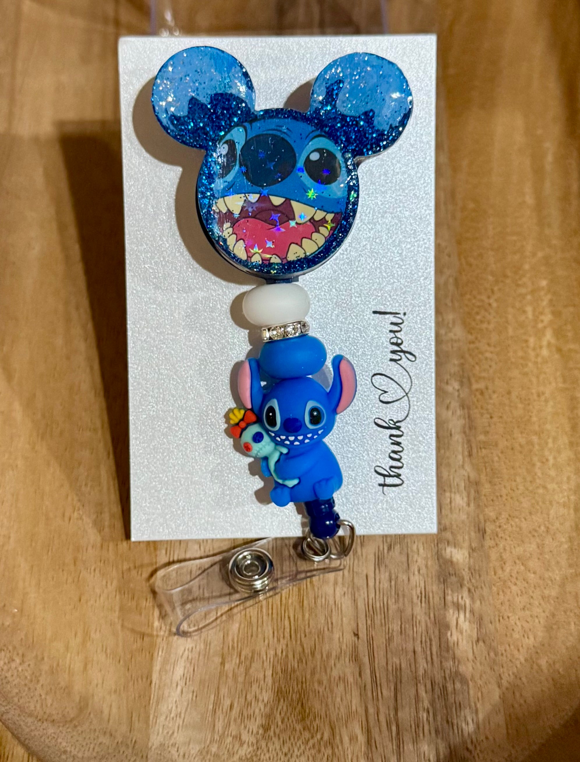 Blue alien badge reel
